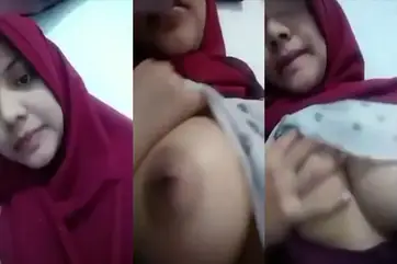 Bokep Jilbab Merah Ukhti Pamer Toket Gede Menggoda