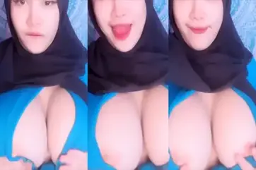 Bokep Jilbab Pamer Dada Montok Tanpa BH Sange